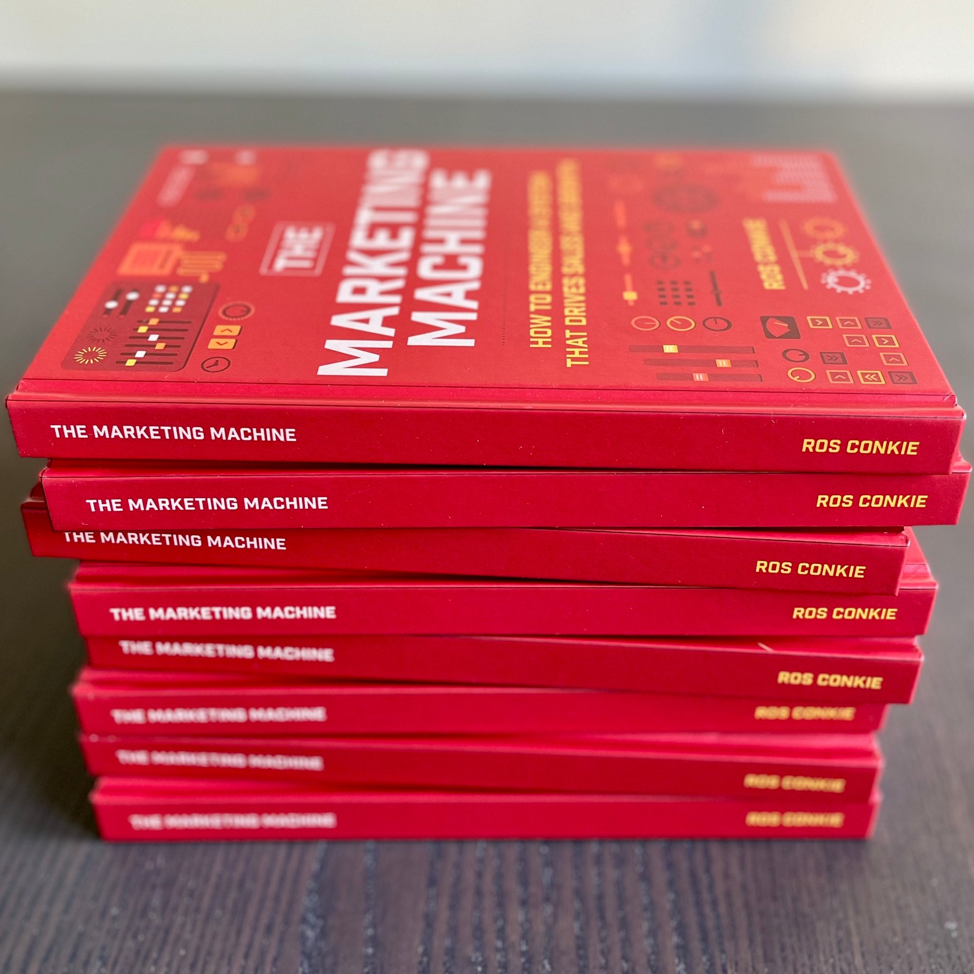 Pile of books: The Marketing Machine